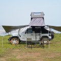 przedsionek-zadaszenie-Wild-Land-dedykowane-do-namiotow-dachowych-lite-cruiser-bush-cruiser-air-cruiser-oba-boki-podniesione.webp