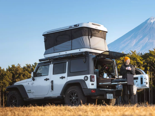 Hannah-Price-@currently.hannah-camping-in-front-of-Mount-Fuji-Japan-2-1-e1743765603395.png