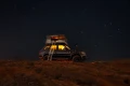 Josh-Walker-with-a-James-Baroud-Evasion-under-a-starry-sky-scaled.webp