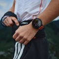 suunto-race-2-coral-orange-on-wrist-2-1200x1200px.webp