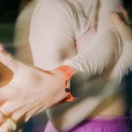 coral-orange-on-wrist.webp