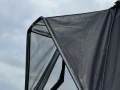 Close-up-of-the-Rain-Shade-installed-on-a-James-Baroud-Nova-rooftop-tent.webp