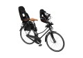 Small-Thule_Yepp_Nexxt2_Maxi-FM_Mini_ChocolateBrown_InUse_OnBike.jpg